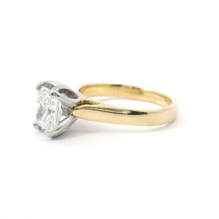 18 Karat Yellow Gold (platinum head) Solitaire Ring